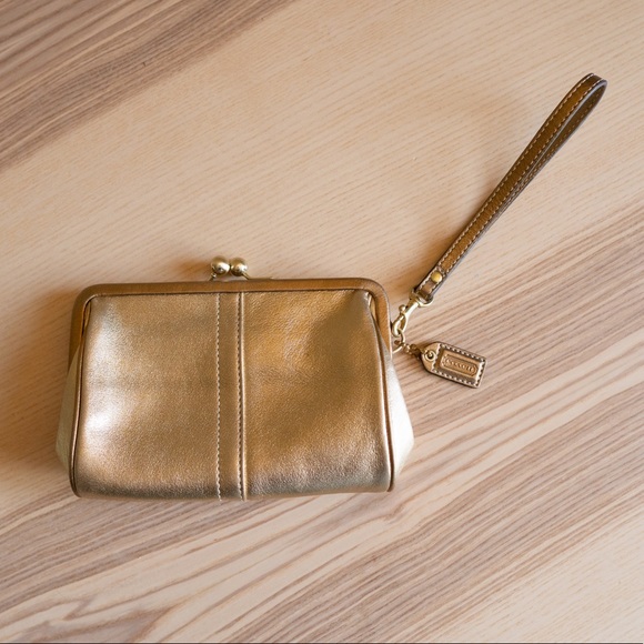 Coach Handbags - Metallic Gold Coach Kiss Snap Wristlet